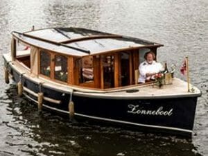 Boot mit Kapitän mieten Grachtentour Amsterdam